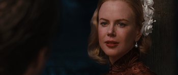 Movie still from “Australia” (2008), directed by Baz Luhrmann – A person with blonde hair; Close Up shot, Over the shoulder angle