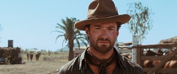 Movie still from “Australia” (2008), directed by Baz Luhrmann – A person wearing a hat; Close Up shot, Over the shoulder angle