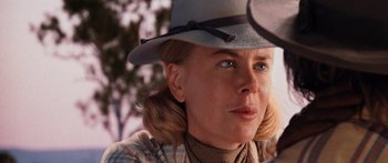 Movie still from “Australia” (2008), directed by Baz Luhrmann – A person wearing a cowboy hat; Close Up shot, Over the shoulder angle
