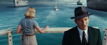 Movie still from “Australia” (2008), directed by Baz Luhrmann – A man and a woman looking out over the ocean; Medium shot, Over the shoulder angle