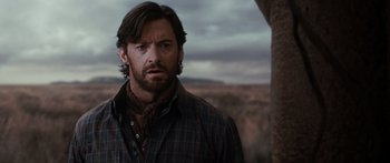Movie still from “Australia” (2008), directed by Baz Luhrmann – Hugh jackman in a scene from the movie les miserables; Close Up shot, Over the shoulder angle
