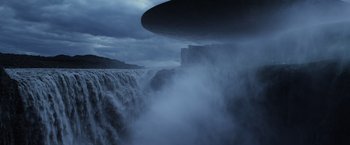 Movie still from “Prometheus” (2012), directed by Ridley Scott – A view of a body of water and a waterfall from below it; Extreme Wide shot, Low angle