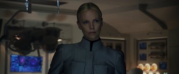 Movie still from “Prometheus” (2012), directed by Ridley Scott – A woman with blonde hair wearing a gray jacket; Close Up shot, Low angle