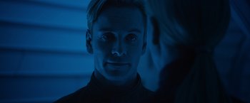 Movie still from “Prometheus” (2012), directed by Ridley Scott – A person looking at the camera; Close Up shot, Over the shoulder angle