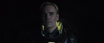 Movie still from “Prometheus” (2012), directed by Ridley Scott – A person wearing a helmet; Close Up shot, Low angle