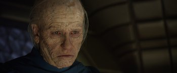 Movie still from “Prometheus” (2012), directed by Ridley Scott – An old man with a very wrinkled face; Close Up shot, Low angle