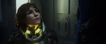 Movie still from “Prometheus” (2012), directed by Ridley Scott – A woman in a space suit looking into the distance; Close Up shot, Low angle