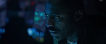 Movie still from “Prometheus” (2012), directed by Ridley Scott – A person looking at the camera; Close Up shot, High angle