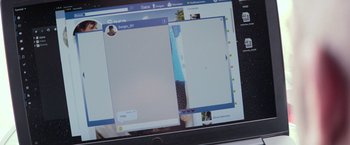 Movie still from “Code Name Emperor” (2022), directed by Jorge Coira – A computer screen showing a person's picture on a social media page; Extreme Close Up shot, High angle