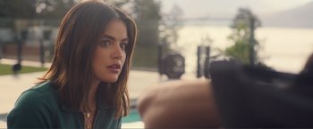 Movie still from “Puppy Love” (2023), directed by Richard Alan Reid – A person taking a picture of another person; Close Up shot, Over the shoulder angle
