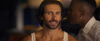 Movie still from “Puppy Love” (2023), directed by Richard Alan Reid – A person wearing a white shirt; Close Up shot, Over the shoulder angle