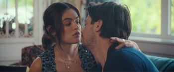 Movie still from “Puppy Love” (2023), directed by Richard Alan Reid – A man and a woman are kissing each other; Close Up shot, Over the shoulder angle