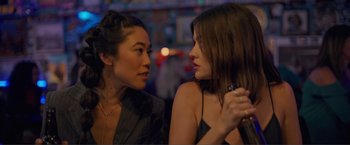 Movie still from “Puppy Love” (2023), directed by Richard Alan Reid – Two women talking to each other in a bar; Close Up shot, Over the shoulder angle
