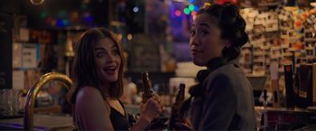 Movie still from “Puppy Love” (2023), directed by Richard Alan Reid – Two women are drinking beer at a bar; Close Up shot, Over the shoulder angle