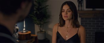 Movie still from “Puppy Love” (2023), directed by Richard Alan Reid – A beautiful young woman wearing a black top; Close Up shot, Over the shoulder angle