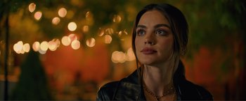 Movie still from “Puppy Love” (2023), directed by Richard Alan Reid – A beautiful young lady wearing a leather jacket; Close Up shot, Over the shoulder angle