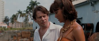 Movie still from “Quantum of Solace” (2008), directed by Marc Forster – A man and a woman standing next to each other; Close Up shot, Over the shoulder angle