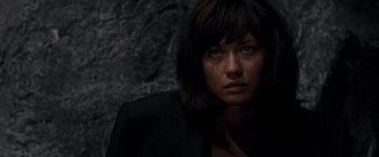 Movie still from “Quantum of Solace” (2008), directed by Marc Forster – A person wearing a suit; Close Up shot, Low angle