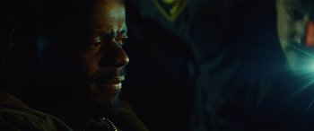 Movie still from “Queen & Slim” (2019), directed by Melina Matsoukas – A person smiling at the camera; Close Up shot, Over the shoulder angle