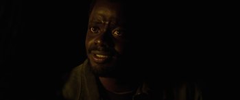 Movie still from “Queen & Slim” (2019), directed by Melina Matsoukas – A person looking at the camera; Close Up shot, Over the shoulder angle