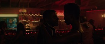 Movie still from “Queen & Slim” (2019), directed by Melina Matsoukas – Two men are facing each other in a dark room; Close Up shot, Over the shoulder angle