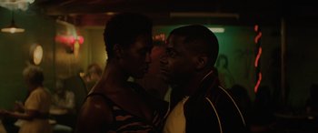Movie still from “Queen & Slim” (2019), directed by Melina Matsoukas – A couple of men standing next to each other; Close Up shot, Low angle