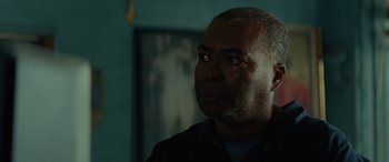 Movie still from “Queen & Slim” (2019), directed by Melina Matsoukas – A person looking at the camera; Close Up shot, Over the shoulder angle