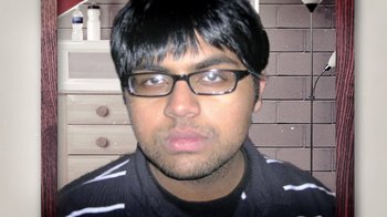Movie still from “Queenmaker: The Making of an It Girl” (2023), directed by Zackary Drucker – A person wearing glasses; Extreme Close Up shot, Low angle