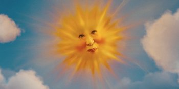 Movie still from “Quiz Lady” (2023), directed by Jessica Yu – A sun with a face in the middle of it; Extreme Close Up shot, Low angle