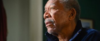 Movie still from “RED” (2010), directed by Robert Schwentke – An older man looking up into the sky; Close Up shot, Low angle