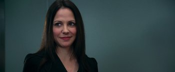 Movie still from “RED” (2010), directed by Robert Schwentke – A person wearing a black shirt; Close Up shot, Over the shoulder angle