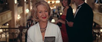 Movie still from “RED” (2010), directed by Robert Schwentke – A person wearing a white jacket; Close Up shot, Over the shoulder angle