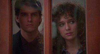 Movie still from “Rain Man” (1988), directed by Barry Levinson – A man and a woman looking out of a window; Close Up shot, Over the shoulder angle