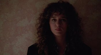 Movie still from “Rain Man” (1988), directed by Barry Levinson – A person with curly hair; Close Up shot, Low angle