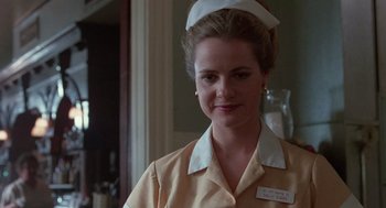 Movie still from “Rain Man” (1988), directed by Barry Levinson – A woman wearing a nurse's uniform and a white hat; Close Up shot, Low angle