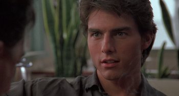 Movie still from “Rain Man” (1988), directed by Barry Levinson – A man's face with a cigarette in his mouth; Close Up shot, Over the shoulder angle