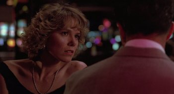 Movie still from “Rain Man” (1988), directed by Barry Levinson – A person talking to another person; Close Up shot, Over the shoulder angle