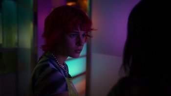 Movie still from “Rainbow” (2022), directed by Paco León – A young man with red hair and a yellow tie; Close Up shot, Over the shoulder angle