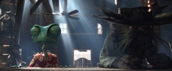 Movie still from “Rango” (2011), directed by Gore Verbinski – A group of people sitting in a room with sun shining; Close Up shot, Low angle