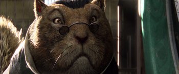 Movie still from “Rango” (2011), directed by Gore Verbinski – A cat wearing glasses and headphones; Close Up shot, Low angle