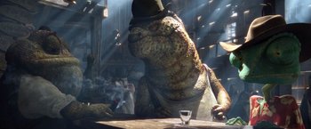 Movie still from “Rango” (2011), directed by Gore Verbinski – A lizard wearing a top hat sitting at a table with smoke coming out of its mouth; Medium shot, Low angle