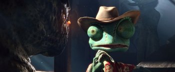 Movie still from “Rango” (2011), directed by Gore Verbinski – A lizard wearing a cowboy hat; Close Up shot, Over the shoulder angle