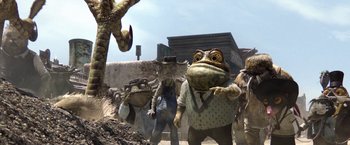 Movie still from “Rango” (2011), directed by Gore Verbinski – A group of people standing next to each other on a dirt field; Wide shot, Low angle