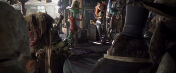 Movie still from “Rango” (2011), directed by Gore Verbinski – A group of people that are standing in a room; Wide shot, Over the shoulder angle