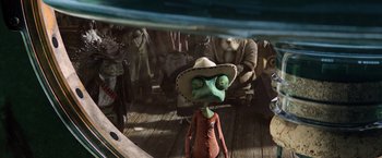 Movie still from “Rango” (2011), directed by Gore Verbinski – A person with a hat on and a hat on; Close Up shot, High angle
