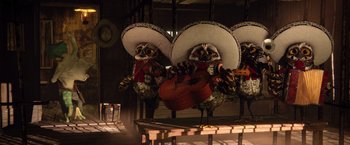 Movie still from “Rango” (2011), directed by Gore Verbinski – A group of owls dressed up like a mariachi band playing instruments; Wide shot, Low angle