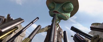 Movie still from “Rango” (2011), directed by Gore Verbinski – A lizard with a hat and a gun in his mouth; Extreme Close Up shot, Low angle