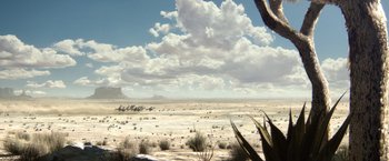 Movie still from “Rango” (2011), directed by Gore Verbinski – An image of a desert scene with clouds in the background; Extreme Wide shot, High angle