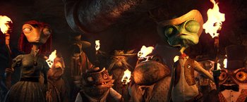 Movie still from “Rango” (2011), directed by Gore Verbinski – A group of people that are standing in the dark; Medium shot, Low angle