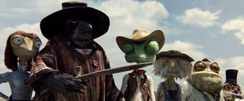 Movie still from “Rango” (2011), directed by Gore Verbinski – A person holding a stick in their hand; Close Up shot, Low angle